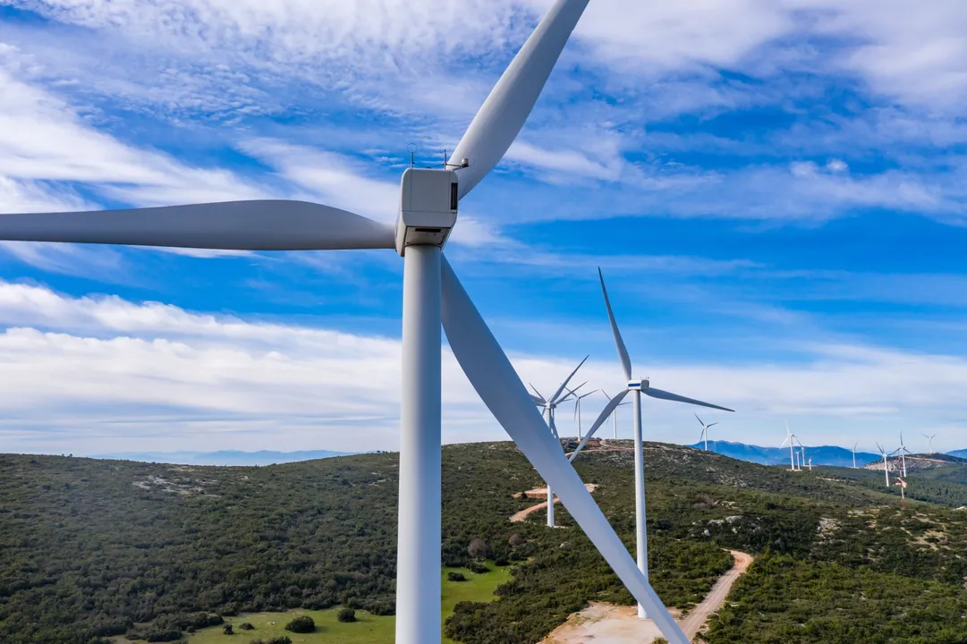 Image showing  wind-farm-wind-turbines-and-curvy-road-on-the-hill-green-ecological-power-energy-generation-1912458199