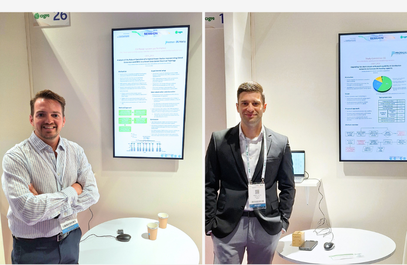 Vasilis Evangelopoulos and Aris Tsimtsios presenting a poster at the CIGRE Paris Session 2026
